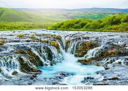 Bruarfoss waterfall in south Iceland. Beautiful summer landscape