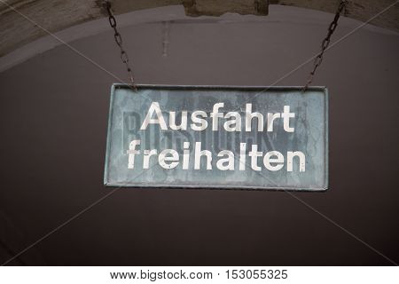 Exit exit above the gate entrance  - table text