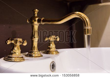 Gold Faucet And Washbasin Design Retro Vintage Decorated Luxury Interior Bathroom