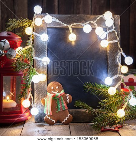 Christmas decoration with small chalkboard and gingerbread man
