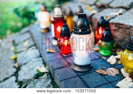 Candles Burning At A Cemetery