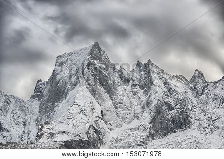 The North Face Of The Mountain Of The Rhaetian Alps In Switzerland. Pizzo Badile