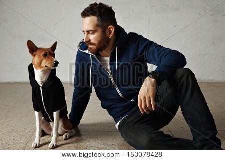 Man And Dog In Matching Hoodies