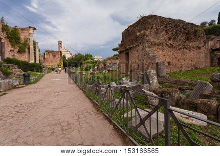ROME ITALY - September 12 2016: Tourists visiting the Roman Forum in Rome during overcast.