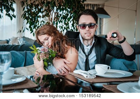 New married couple in a cafe