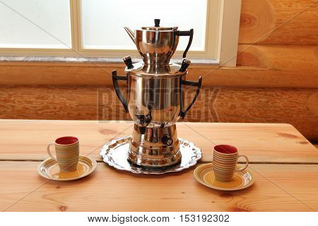 Composition with samovar / The samovar is on the table