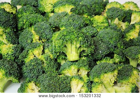 Macro closeup of green vegetables: cut broccoli. Broccoli texture closeup for any ideas. Fresh vegetables concept.