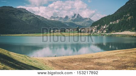 Amazing sunny day at Champferersee lake in the Swiss Alps. Silvaplana village, Switzerland, Europe. Toned like Instagram filter