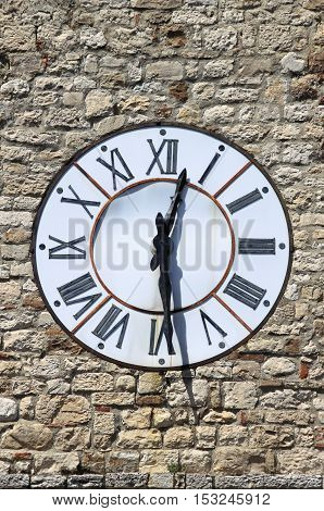 The clock of Clock tower of Todi, Italy