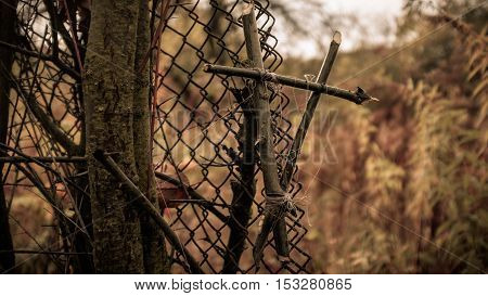 Witch vampire hallowen tied branches symbol on the metal net