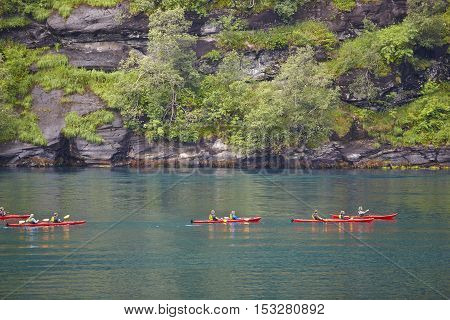 Norwegian fjord landscape with kayaks and rocks. Travel Norway. Horizontal