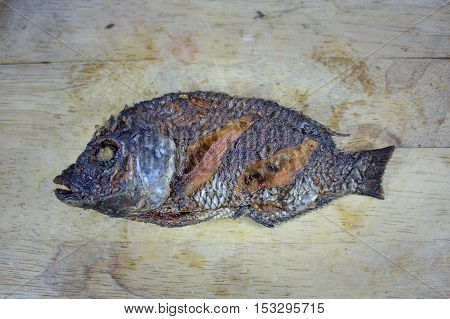 Fish Fry on Chopping Wood and asian food .