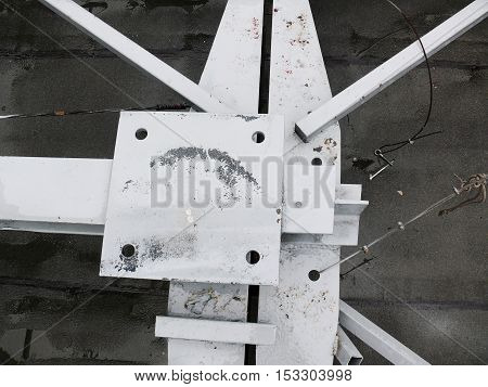 metal construction on the roof of the building.