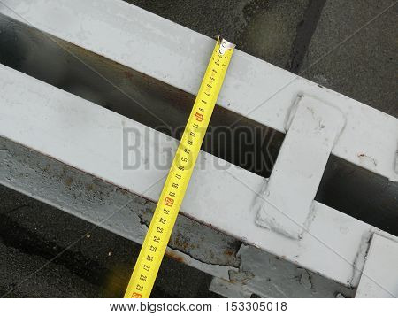 measurement of the dimensions of metal structures on the roof.