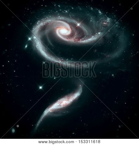 A Rose Made of Galaxies UGC 1810 and UGC 1813. Group of spiral galaxies in the constellation Andromeda. Elements of this image furnished by NASA.