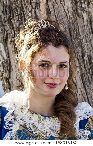 CAGLIARI, ITALY - May 29, 2016: Sunday at La Grande Jatte VIII Ed. At the Public Gardens - Sardinia - portrait of a beautiful girl in Victorian costumes