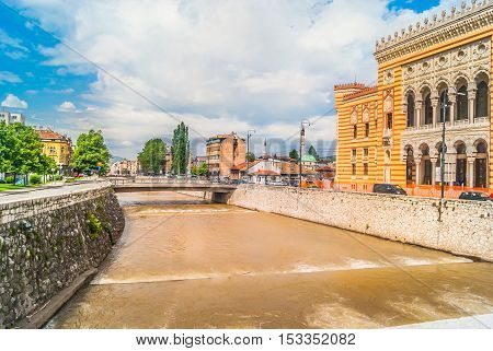 View at cityscape in town Sarajevo located on famous river Miljacka, Bosnian and Herzegovina capital, Europe.