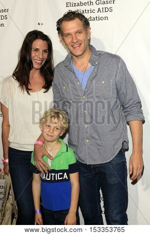 LOS ANGELES - OCT 23:  Jennifer Carta, guest, Jeffrey Nicholas Brown at the  A Time For Heroes Event at Smashbox Studios on October 23, 2016 in Culver City, CA