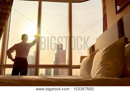 Business Man Looking In The Window