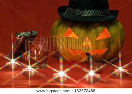 Pumpkin for Halloween with glowing eyes by candlelight
