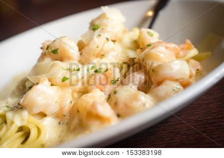 Fresh Italian shrimp scampi with shaved parmesan cheese