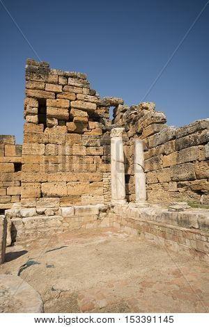 Hierapolis City Ruins. The ruins of the ancient city of Hierapolis is located adjacent to the hot springs of Pamukkale in Turkey. The site is a UNESCO world heritage site.