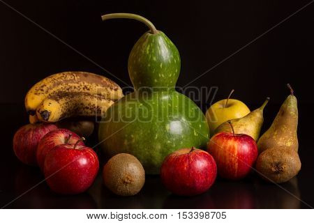 fruits on a dark background, studio picture