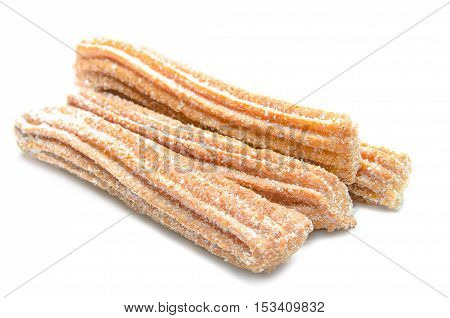 Churros stacked and isolated on white background