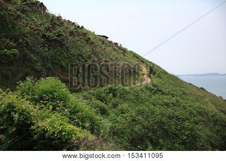 Trail along the beach coast of Wales.
