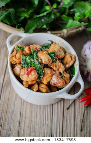 Kapro Kai, Stir Fried Basil Cicken on wooden Thai Famous Food Thai Street Food Thai Cuisine Thai Spicy Food