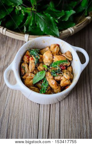 Kapro Kai, Stir Fried Basil Cicken on wooden Thai Famous Food Thai Street Food Thai Cuisine Thai Spicy Food