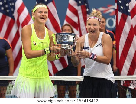 NEW YORK - SEPTEMBER 11, 2016: US Open 2016 women doubles champions  Lucie Safarova (L) of Czech Republic and Bethanie Mattek-Sands of United States during trophy presentation in New York