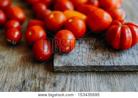 Tomato On Wooden Table. Freshly Picked Red Tomatoes. Variation O