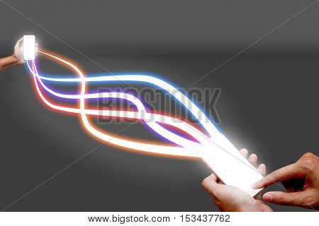 Man holding mobile phone and fiber optical light network.