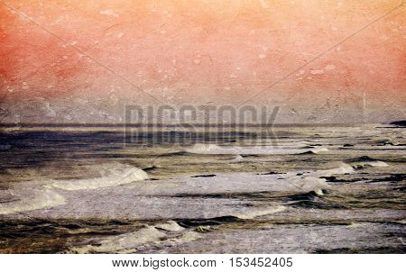 Landscape with the rocky coastline of Strandfontein at sunset