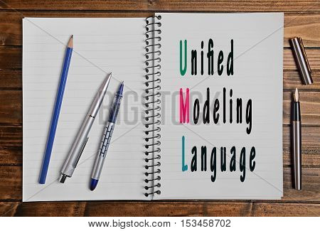 The words Unified Modeling Language on notepad page