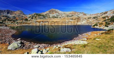 Autumn landscape in Natural Park Retezat, Bucura Lake, Romania, Europe