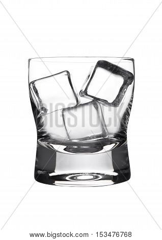 Empty glasss of whiskey with ice cubes isolated on white background