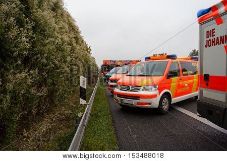 HANNOVER / GERMANY - OCTOBER 25 2016: german emergency service cars stands in a row on freeway a2 by a truck crash near Hannover.