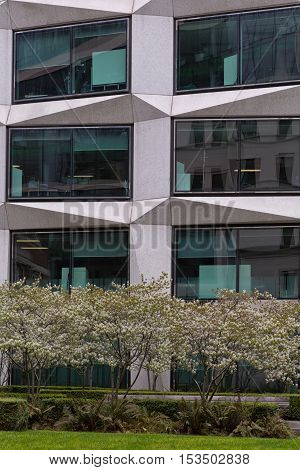 London United Kingdom - April 2016: Cropped street view of a commecial office building. Frontal facade