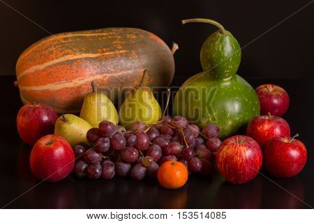 fruits on a dark background, studio picture