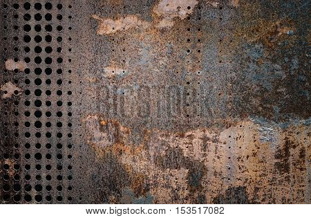 The vintag rusty grunge steel decorated by drilling a wall textured background