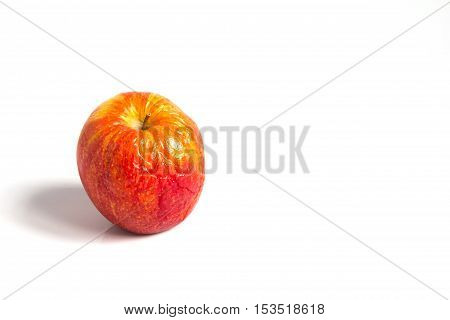 Wizen apple presented as old aging skin