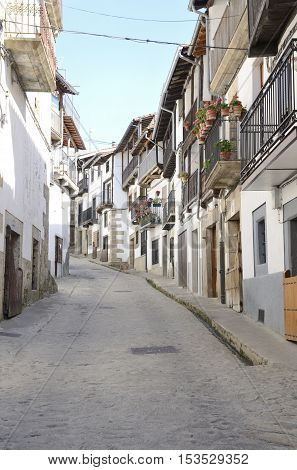 Steep street in the picturesque village of Candelario in the province of Salamanca Spain.