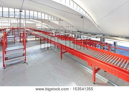 Red Conveyor Belt Distribution and Delivery Warehouse
