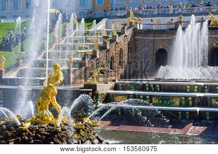 PETERHOF, RUSSIA - MAY 26, 2015: Samson Fountain, the Grand Cascade and Grand Peterhof Palace. Peterhof Palace included in the UNESCO World Heritage List. Petergof, Saint Petersburg, Russia