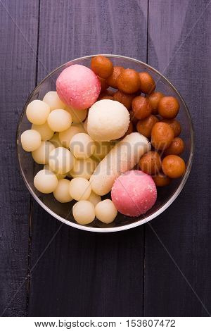 Bangladesh or kolkata's or India's favourite sweet rasgulla, chamcham and gulab jamun, dry rasgulla, bengal sweets, made of milk / khoya, sweet meets, extreme closeup