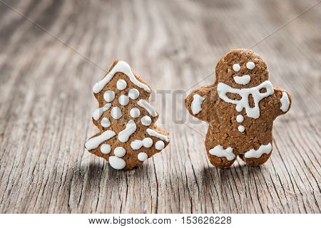 Gingerman And Christmas Tree Made Of Gingerbread Dough As Backgorund