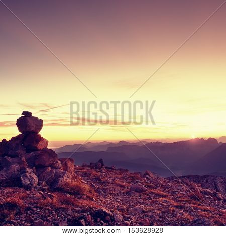 Pebbles Pyramid. Stones On Apine Gravel Mountain Summit. Daybreak Horizon