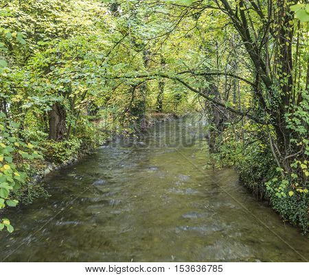 Beautiful River Wuerm With Green Trees In Munich